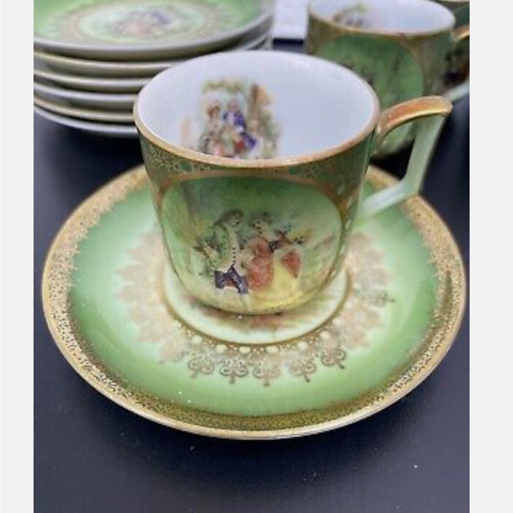 Demi tasse cup and saucer . Courting couples